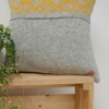 Knitted cushion "Eto" - yellow & light grey